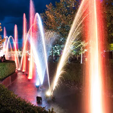 Illuminated water fountains during long nights at LEGOLAND Deutschland