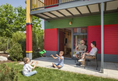 Family on the terrace in the NINJAGO quarter in the LEGOLAND vacation village