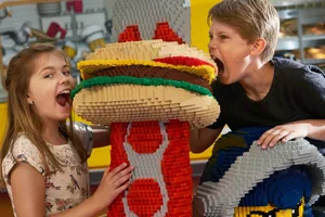 kids with a big LEGO hamburger in the LEGOLAND Restaurant STARS Grill House