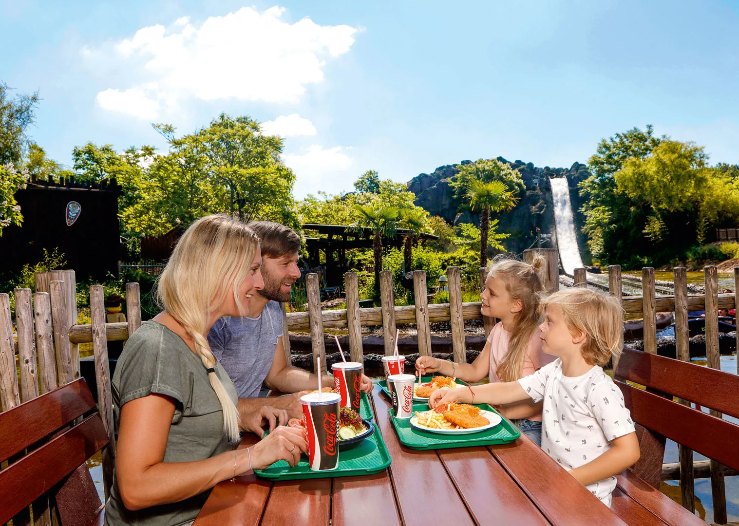 Family eats schnitzel and fries at the LEGOLAND Restaurant Schnitzel Depot