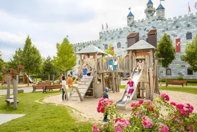 Playground with family in front of Ritterburg Hotel in LEGOLAND Holiday Village