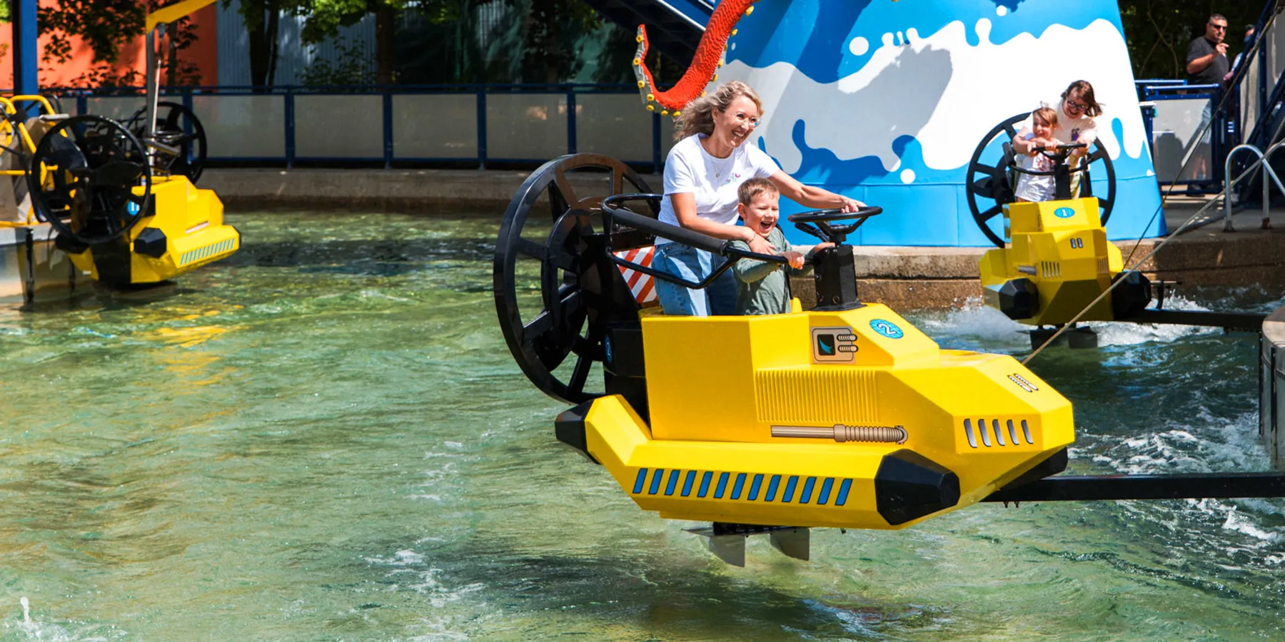Family on wave surfers at LEGOLAND Germany