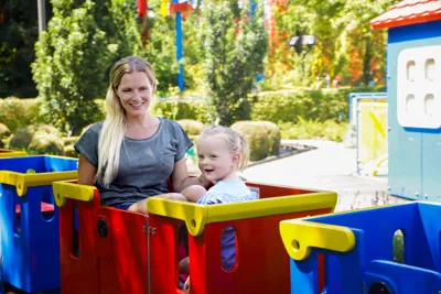mother and daughter on LEGOLAND DUPLO express