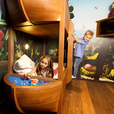 playing kids in LEGOLAND Pirate Island Hotel room