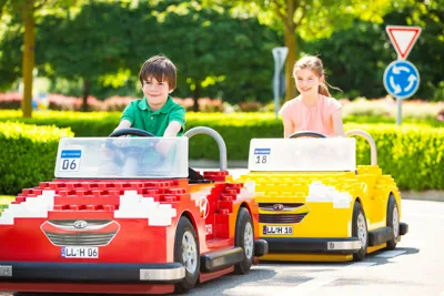 Children in cars for children at LEGOLAND driving school