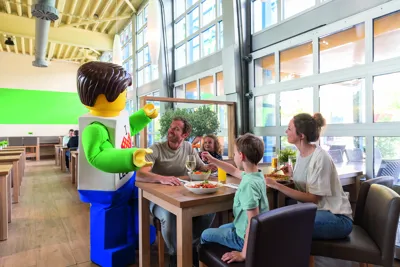 Family at LEGOLAND Germany restaurant Pizza Mania