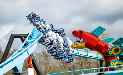 Big red snake in front of Maximus roller coaster at LEGOLAND Deutschland Resort
