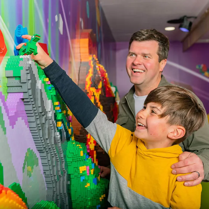 Father and son in the MYTHICA CreaZone at LEGOLAND
