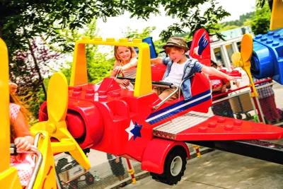 Two children in the LEGOLAND airport ride