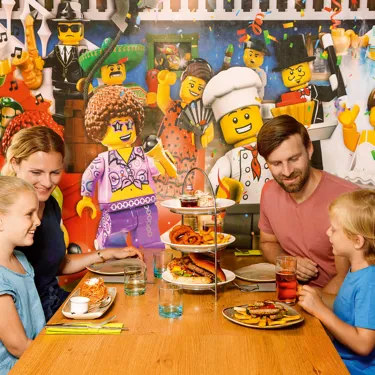 Family eating burgers at LEGOLAND Restaurant Stars Grill House