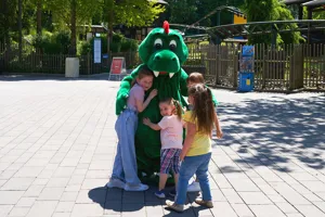 Children with LEGOLAND park dragon Olli
