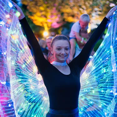 Artist with large butterfly wings during Long Nights at LEGOLAND Deutschland